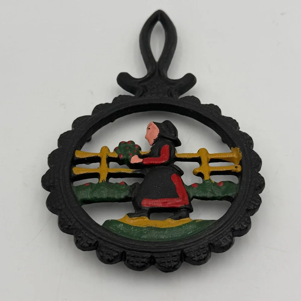 Vintage Cast Iron Trivet Hand Painted Amish Woman Folk Art Farmhouse Decor